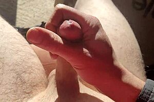 edging from flaccid, playing with precum in natural light