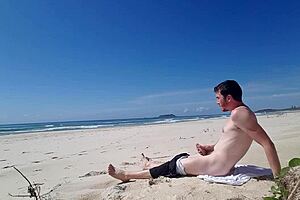 Gay solo pleasure outdoors on the beach