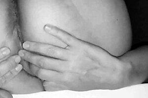 Slut wife with big ass sucks dick in home video, jerking off her husband.