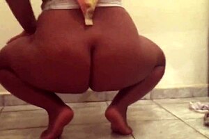 A hot milf of a mulatto strip and have sex