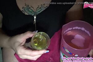 german housewife drinks piss on balcony