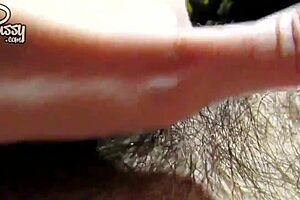 Close up of a big hairy clitoris during homemade solo action