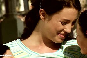 Lesbians finger wet pussies on lawn in sapphix scene