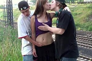 Public gang bang with a young blonde teen on the street