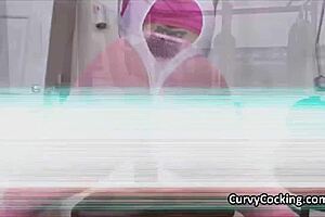 Eighties babe pounds pussy during intense gym workout.