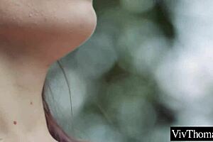 Red-haired lesbian gives a blow job to an unknown woman