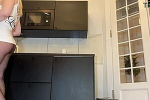 This tall blonde wife shows off her big tits and ass in the kitchen for casting.