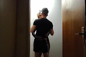 building cameras catch friends hanging out in hallway after gym