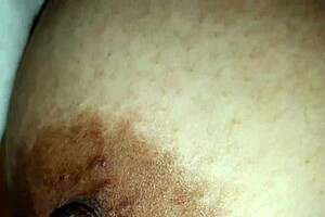 Squeezing step nipples while squeezing big tits