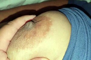 Squeezing step nipples while squeezing big tits