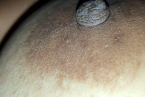 Squeezing step nipples while squeezing big tits