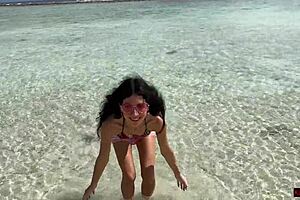 Beauty pees on the maldives beach and gets golden shower on her glasses