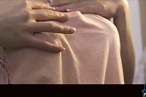 Big Breasted Euro Babe Exposes Tits While Undressing.