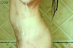Charming brunette teen model takes shower during casting interview on sofa