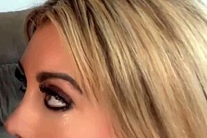 this kinky blonde babe massaging her juicy pussy with toys