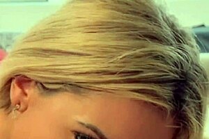 this kinky blonde babe massaging her juicy pussy with toys