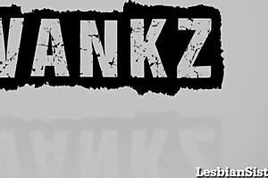 Two Black Babes Engage in Play with Strap-On