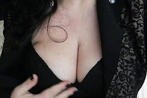 Beautiful woman with natural large breasts in hot scene