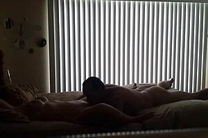 A secret camera captures a middle aged woman in sexual activity
