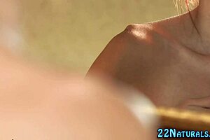 The redhead babe steps into the shower, letting the water flow as she starts masturbating her pussy erotically.