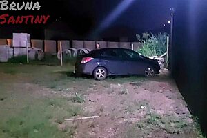 Bruna performs detailed blowjob and shows ass and boobs in club parking lot with big cock