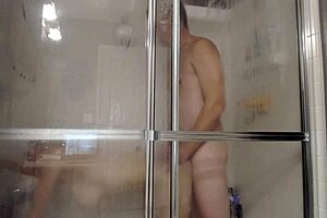 hey, check this out, husband and wife getting it on in the shower with toys