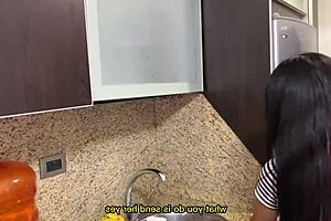Sexy stepdaughter cleans the kitchen in a tight dress