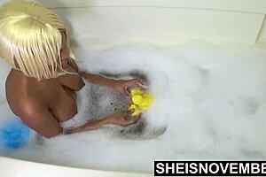 Msnovember washes up in the bathtub with a rubber ducky, her natural boobs hanging with big areolas and dark nipples in hd.