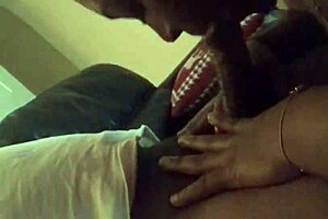 Beautiful black girl gives a deepthroat blowjob to a big cock