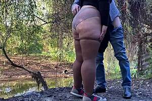 milf grips my dick tight while fingering herself outdoors in public