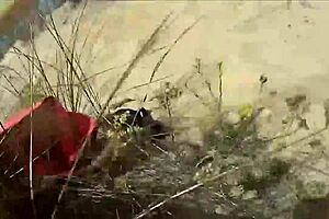 Suzisoumise enjoys a public beach outing