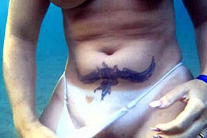 Amazing amateur blonde gives blow job in the sea