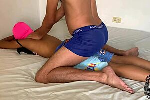 A black beauty gets a sensual massage with olive oil from a hot Latino man