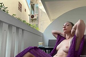 Naked On Balcony Overlooking Houses