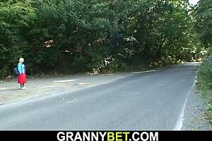 Old blonde gets hairy pussy licked outdoors