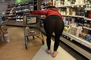 Staged flashing in transparent leggings at grocery store