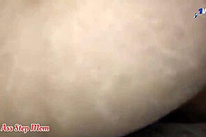 I can't believe I'm sharing a bed with my milf step mom, feeling so horny!