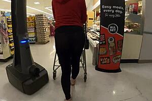 Staged flashing in transparent leggings at grocery store