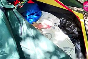 While camping, I spotted a girl engaging in solo masturbation.