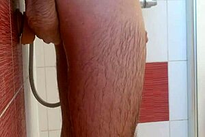 Solo player has fun in the shower with sex toys