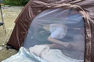 Amateur girl holds back moans for blowjob in tent at camp. 😏