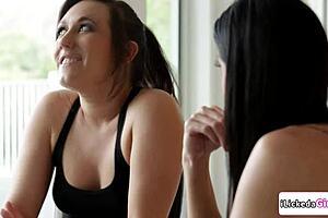 Lesbian milf and young stepdaughter engage in intimate kissing