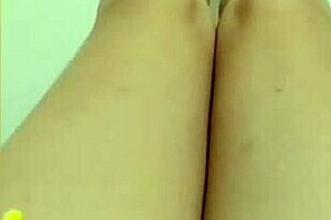 cute girl displays legs then fingers wet pussy