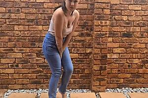 Tattooed slut indulges in messy pissing indoors and outdoors, naked or clothed