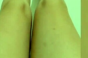 cute girl displays legs then fingers wet pussy