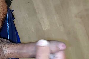 Gay masturbation with a cum shot on the floor