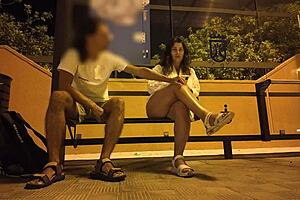 Hey, watch this stranger seduce a curvy milf at the bus stop for street banging! 😍