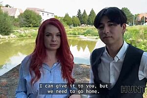 Redhead teen shows her mettle in public pussy show