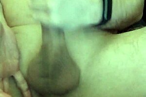 pushing in the large black plug