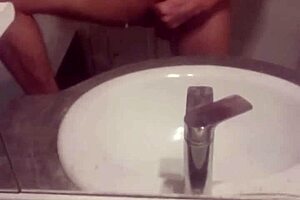 young guy jerks off his cock hard
